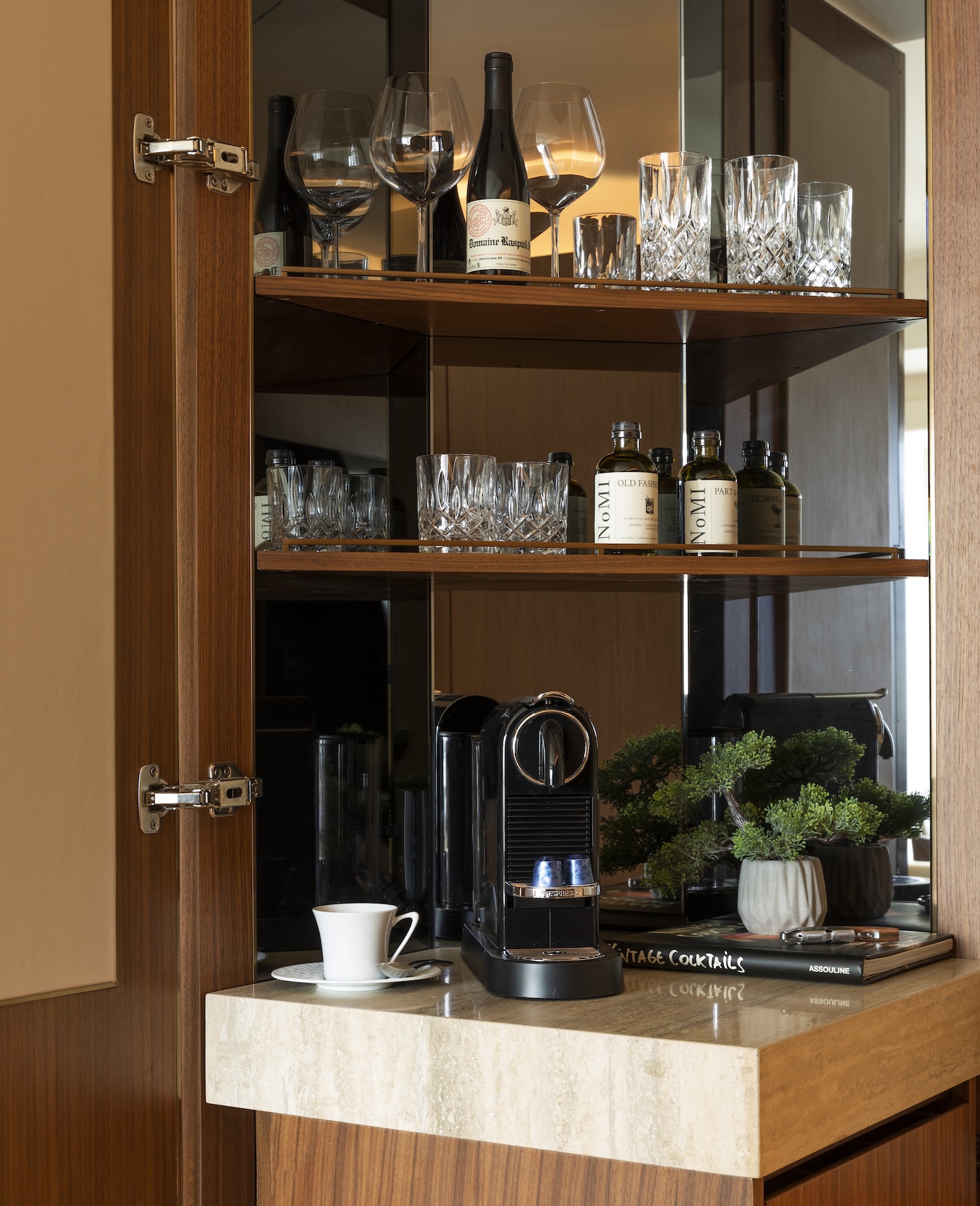 In-room bar at Park Hyatt Chicago with NoMI glassware and spirits